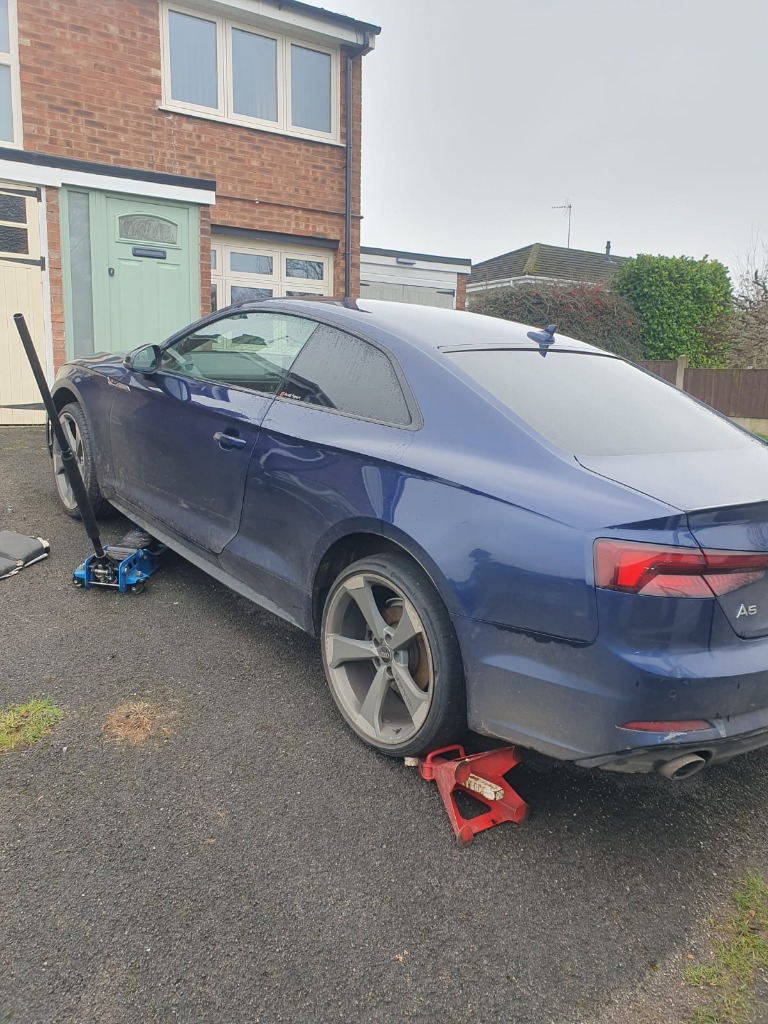 Audi A5 brake and suspension work on driveway